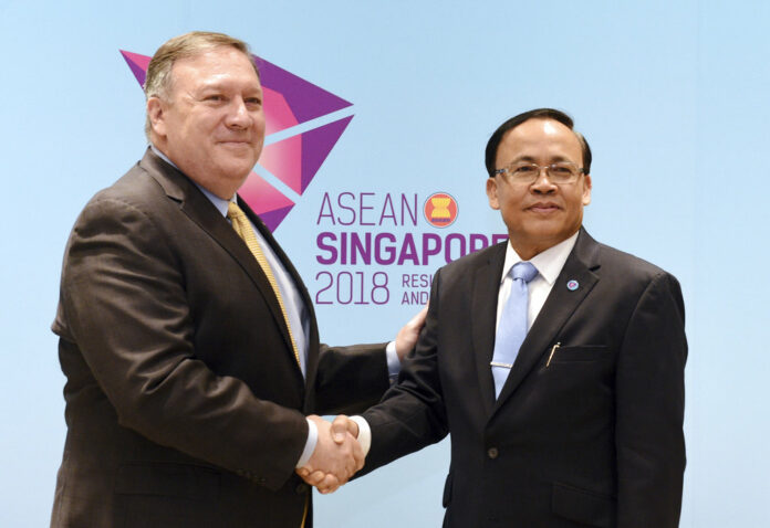 U.S. Secretary of State Mike Pompeo, at left, meets Myanmar's Minister of State for Foreign Affairs U Kyaw Tin on the sidelines of the 51st ASEAN Foreign Ministers Meeting on Saturday in Singapore. Photo: Joseph Nair / Associated Press