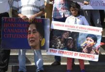 UN Team: Myanmar Military Chiefs Should Face ‘Genocide’ Case People hold signs against Myanmar leader Aung San Suu Kyi and the killing of the Rohingya people during a remembrance event to mark the one-year anniversary of the attacks that sent them fleeing to safety in Bangladesh, while holding a rally on Parliament Hill on Saturday in the Canadian capital of Ottawa. Photo: Justin Tang / The Canadian Press via AP