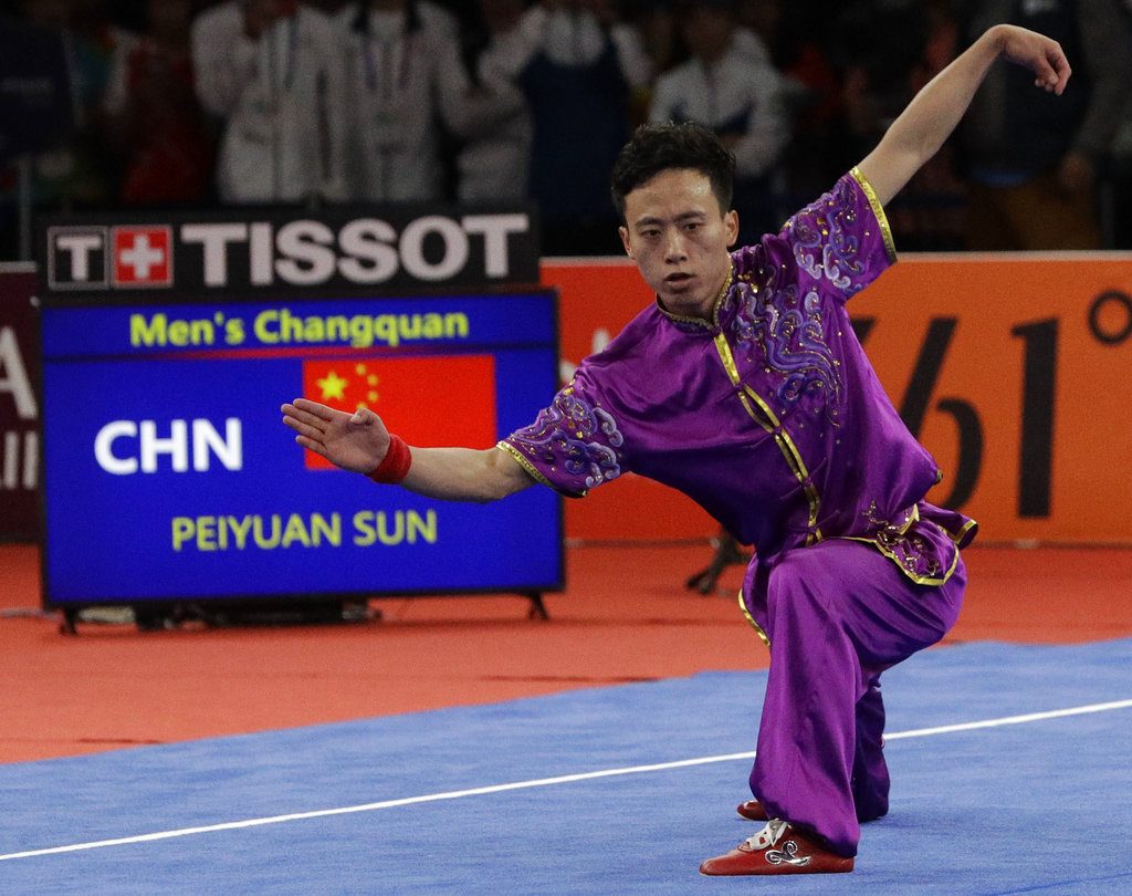 China's Peiyuan Sun performs during the Wushu games at the 18th Asian Games in Jakarta. Phot: Aaron Favila / Associated Press