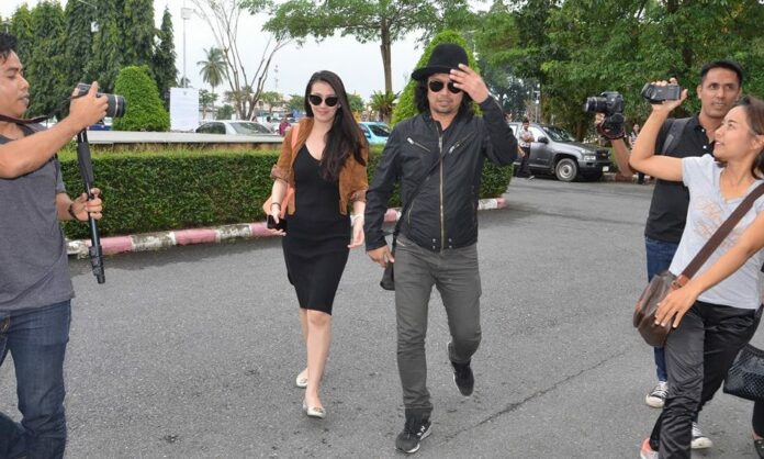 Sek Loso and his girlfriend arrive at a court in Nakhon Si Thammarat province on Jan. 15, 2018.