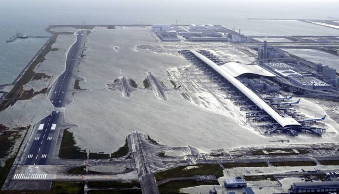 Kansai International Airport is partly inundated Tuesday following a powerful typhoon in Izumisano, Osaka prefecture, western Japan. Photo: Kentaro Ikushima / Associated Press