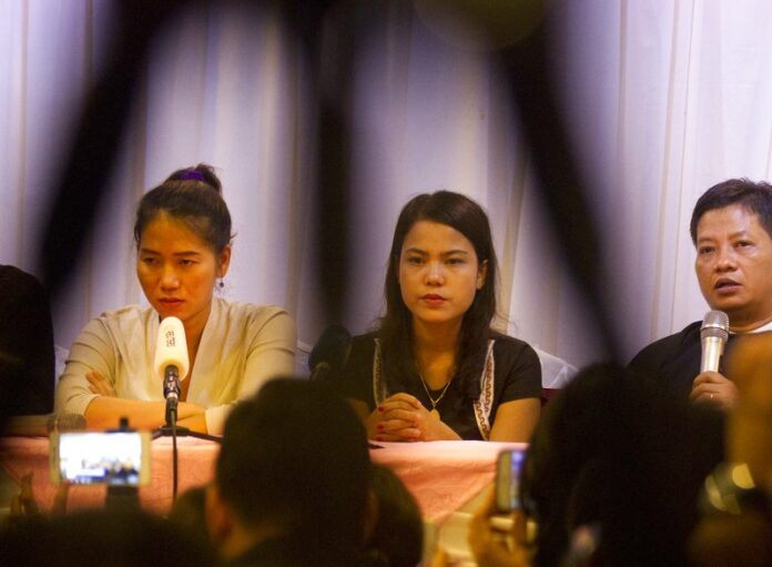 Than Zaw Aung, right, a lawyer of two Reuters journalists, talks to journalists during a press briefing together with Pan Ei Mon, second left, wife of Reuters journalist Wa Lone, Chit Su Win, second right, wife of Reuters journalist Kyaw Soe Oo, and Khin Maung Zaw, left, a lawyer of two Reuters journalists, at a hotel Tuesday, Sept. 4, 2018, in Yangon, Myanmar. Photo: Thein Zaw / Associated Press