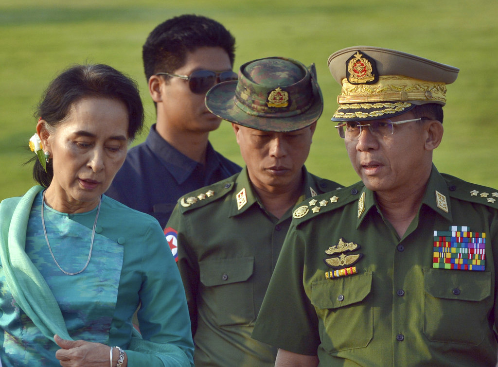 Aung San Suu Kyi, Myanmar's foreign minister and de facto leader, left walks in 2016 with senior General Min Aung Hlaing, Myanmar's commander-in-chief, right, in Naypyitaw, Myanmar. Photo: Aung Shine Oo / Associated Press