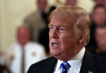 Day 13: Dems Pass Funding Plan Without Wall, Trump Digs In President Donald Trump responds to a reporters question Wednesday during an event with sheriffs in the East Room of the White House in Washington. Photo: Susan Walsh / Associated Press