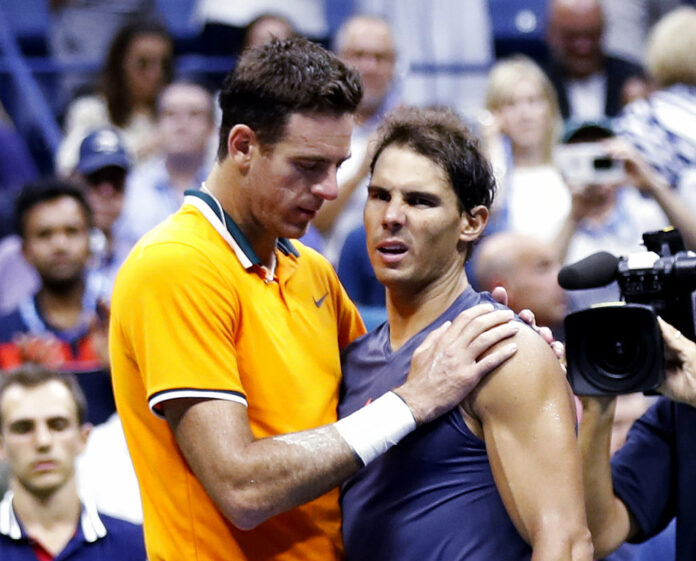 Juan Martin del Potro, of Argentina, talks with Rafael Nadal, of Spain, after Nadal retired from the match during the semifinals of the U.S. Open tennis tournament, Friday, Sept. 7, 2018, in New York. Photo: Adam Hunger / Associated Press