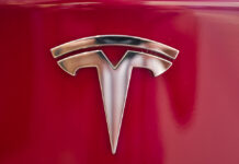 Tesla Cuts Number of Stock Colors to Streamline Production This Aug. 8, 2018, file photo shows a Tesla emblem on the back end of a Model S in the Tesla showroom in Santa Monica, California. Photo: Richard Vogel / Associated Press