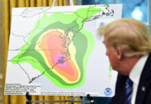 ‘Big and Vicious’: Hurricane Florence Closes in on Carolinas President Donald Trump looks at a chart showing potential rainfall totals from Hurricane Florence on Tuesday during a briefing in the Oval Office of the White House in Washington. Photo: Susan Walsh / Associated Press