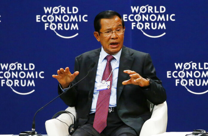 Prime Minister Hun Sen of Cambodia gestures as he talks about his vision for the Mekong region in the World Economic Forum on ASEAN at the National Convention Center Wednesday, Sept. 12, 2018 in Hanoi, Vietnam. Photo: Bullit Marquez / Associated Press