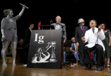 Boss Revenge, Self-Colonoscopy Studies Win 2018 Ig Nobels Akira Horiuchi, right, of Japan, who won the Ig Nobel in medical education demonstrates his self colonoscopy technic during award ceremonies Thursday at Harvard University in Cambridge, Massachusetts. Photo: Michael Dwyer / Associated Press