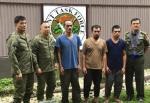 Militants Free 3 Indonesian Hostages in Southern Philippines In this photo released by the Armed Forces of the Philippines, three Indonesian hostages (in civilian clothes) pose with Philippine military officers and an Indonesian military attache in Zamboanga city following their Friday release from captivity in Jolo, Sulu by Muslim militant kidnappers Sunday, Sept. 16, 2018, in the southern Philippines. Photo: Associated Press