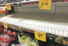 Needle-in-Strawberry Scare Spreads Across Australia Empty shelves, normally stocked with strawberry punnets, are seen Friday at a Coles Supermarket in Brisbane, Australia. Photo: Dan Peled / Associated Press