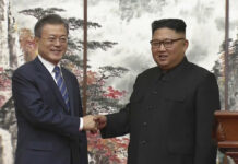 Both Koreas Say They Plan Joint Bid for 2032 Olympics North Korean leader Kim Jong Un, right, and South Korean President Moon Jae-in shake hands at the end of their joint press conference Wednesday in Pyongyang, North Korea. Photo: Associated Press