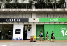 Singapore Fines Uber, Grab for ‘Anti-Competitive’ Merger