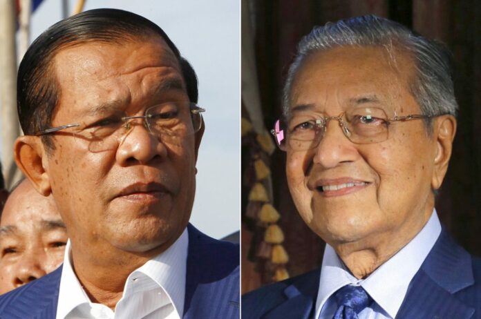 FILE - In this combination of two photos showing Cambodian Prime Minister Hun Sen, left, in Phnom Penh, Cambodia, on Aug. 1, 2018, and Malaysia's Prime Minister Mahathir Mohamad in Putrajaya, Malaysia, on Aug. 13, 2018. Photo: Associated Press
