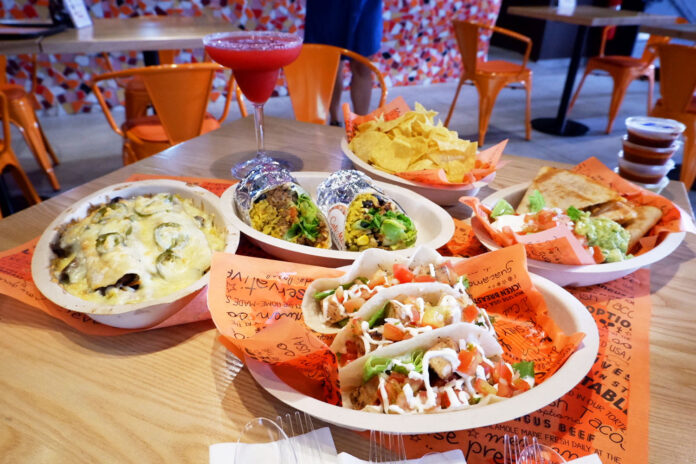 Clockwise from left, enchiladas (฿399), burritos (฿299) a half quesadilla (฿299) and chicken tacos (฿299).
