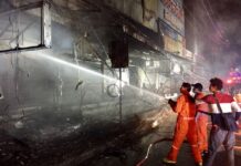 Electrical Fire Near Central Ladprao Leaves 2 Hospitalized Firefighters respond to a fire early Wednesday morning near Central Plaza Lardprao in Bangkok.