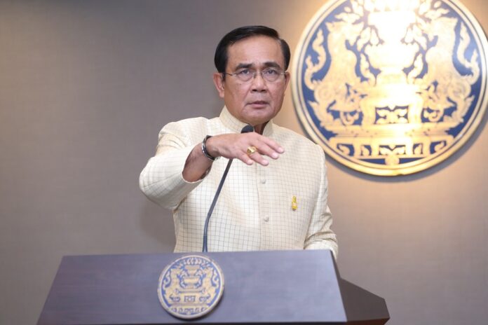 Prime Minister Prayuth Chan-ocha speaks to reporters in September in Bangkok.