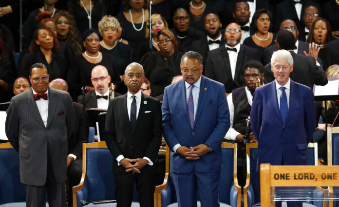 Louis Farrakhan, from left, Rev. Al Sharpton, Rev. Jesse Jackson and former President Bill Clinton attend the Friday funeral service for Aretha Franklin at Greater Grace Temple. Photo: Paul Sancya / Associated Press