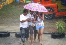 Typhoon Mangkhut Plows Through Rain-Soaked Philippines Residents walk as rains from Typhoon Mangkhut begin to affect Tuguegarao city, Cagayan province, northeastern Philippines on Friday. Photo: Aaron Favila / Associated Press