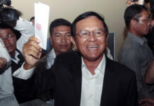 Former Opposition Party Leader Freed in Cambodia Then opposition Cambodia National Rescue Party President Kem Sokha shows off his ballot before voting in June 2017 in local elections in Chak Angre Leu on the outskirts of Phnom Penh. Photo: Heng Sinith / Associated Press