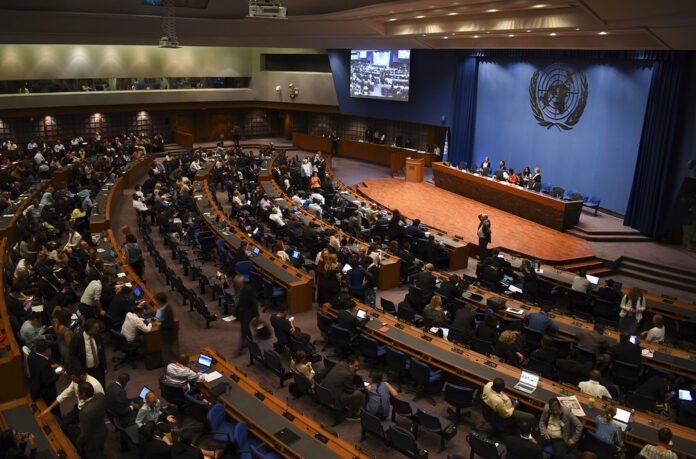 Delegates meet for a UN climate change conference Sunday in Bangkok. Photo: Kaweewit Kaewjinda / Associated Press