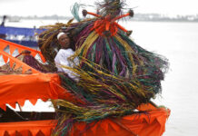 Nigerian Voodoo Festival Shows Strength of Traditions People dressed in Zangbeto masquerade costume prepare to parade during a regatta to mark the Badagry festival Saturday in Badagry, Nigeria. Photo: Sunday Alamba / Associated Press