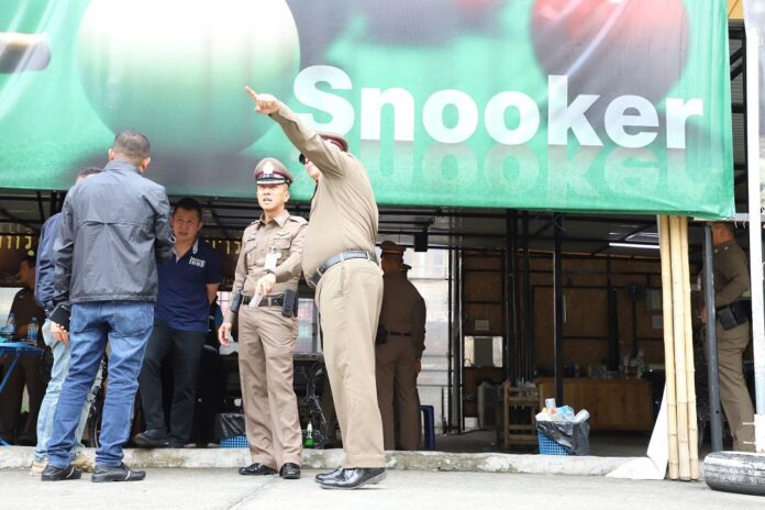Police on Monday investigate the snooker bar where an altercation there escalated into a shootout.
