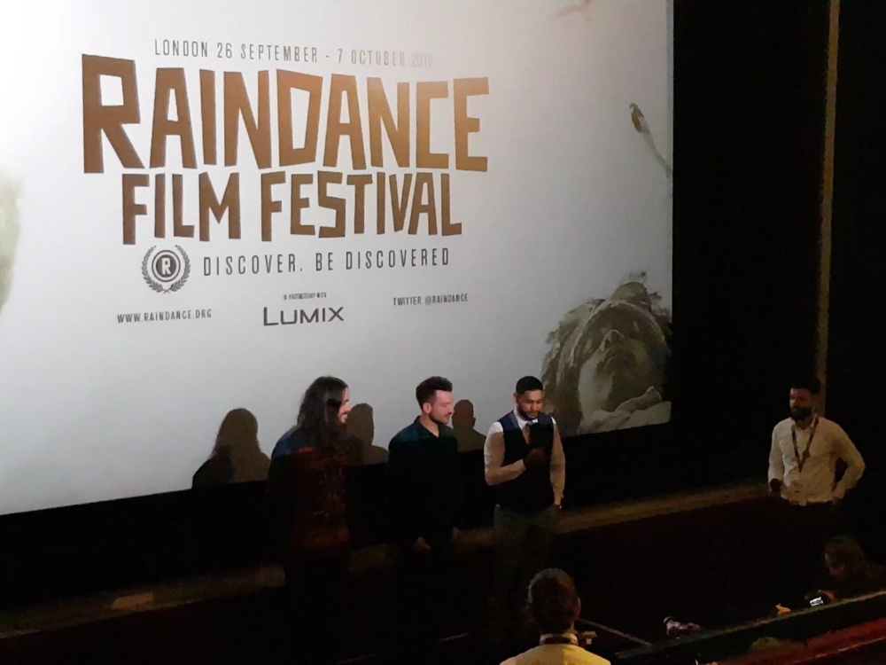 From left: Oliver Clark, Blair MacDonald and Amir Khan speak Saturday following the screening of "Team Khan" at the Raindance Film Festival in London, England.