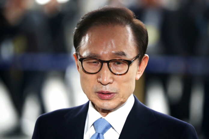 In this March 14, 2018, file photo, former South Korean President Lee Myung-bak arrives for questioning over bribery allegations at the Seoul Central District Prosecutors' Office in Seoul, South Korea. Photo: Kim Hong-Ji / Associated Press