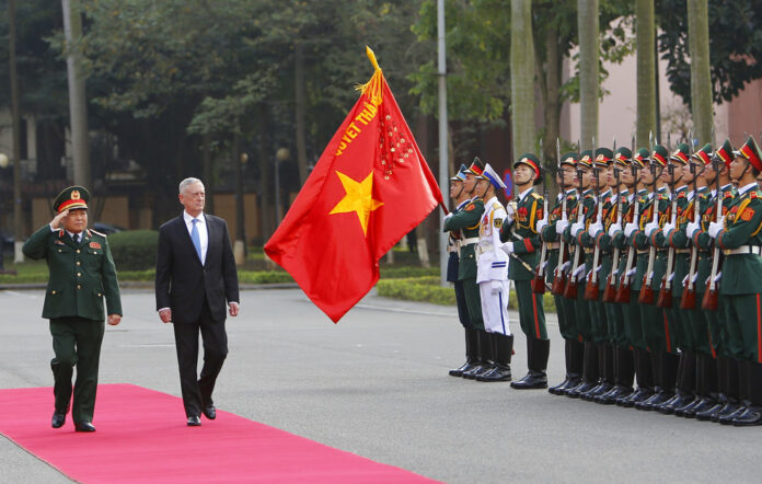 U.S. Defense Secretary Jim Mattis and his Vietnamese counterpart Ngo Xuan Lich, left, review an honor guard in January in Hanoi, Vietnam. Photo: Tran Van Minh / Associated Press