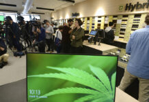 Canada Now World’s Largest Legal Marijuana Marketplace Members of the media attend a Tuesday preview for one of Quebec's new cannabis stores in Montreal, Canada. Photo: Ryan Remiorz / Associated Press