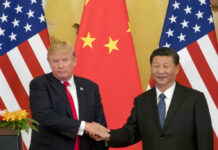 U.S. Officials Still Eye China Opportunities Despite Trade Tensions President Donald Trump and Chinese President Xi Jinping shake hands in 2017 during a joint statement to members of the media Great Hall of the People in Beijing, China. Photo: Andrew Harnik / Associated Press