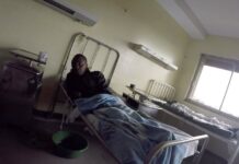Hospitals Imprison Patients in Thailand, Kenya, Congo, China Detained patients lie on beds in August in the Kenyatta National Hospital in Nairobi, Kenya. Photo: Desmond Tiro / Associated Press