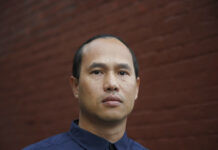 Cambodian Refugee Who Killed as 14-Year-Old Seeks Pardon Borey Ai poses for a photo Tuesday outside of the Asian Americans Advancing Justice-Asian Law Caucus in San Francisco, California. Photo: Jeff Chiu / Associated Press