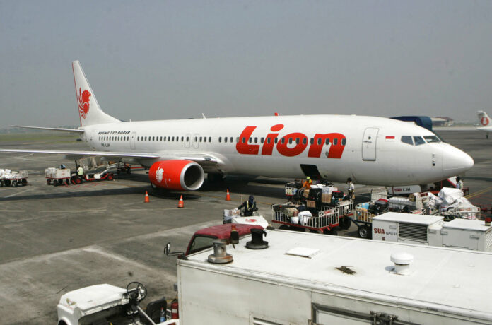 A Lion Air passenger jet is parked on the tarmac in 2012 at Juanda International Airport in Surabaya, Indonesia. Photo: Trisnadi / Associated Press