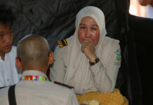 Woman Recounts Problems on Lion Air Jet’s Previous Flight A relative of a passenger of a Lion Air plane cries while waiting for update on the plane that crashed off Java Island, at Tanjung Priok Port in Jakarta, Indonesia. Photo: Tatan Syuflana / Associated Press