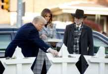 Synagogue Extremist Was Obsessed With Jewish Refugee Agency From left, President Donald Trump, accompanied by first lady Melania Trump, and Tree of Life Rabbi Jeffrey Myers, puts down a stone from the White House on Tuesday at a memorial for those killed at the Tree of Life Synagogue in Pittsburgh. Photo: Andrew Harnik / Associated Press