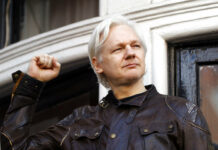 Ecuador Tells Assange to Speak Carefully and Take Care of His Cat WikiLeaks founder Julian Assange greets supporters on May 19, 2017, outside the Ecuadorian embassy in London. Photo: Frank Augstein / Associated Press