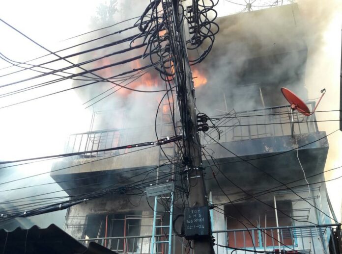 A fire Friday morning at a gesthouse near Khaosan Road in Bangkok.