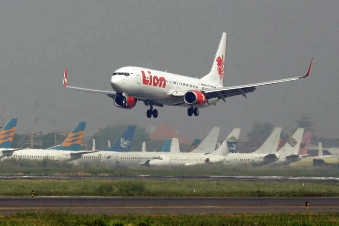 A Lion Air passenger jet takes off from Juanda International Airport in Surabaya, Indonesia, in a 2012 file photo. Photo: Trisnadi