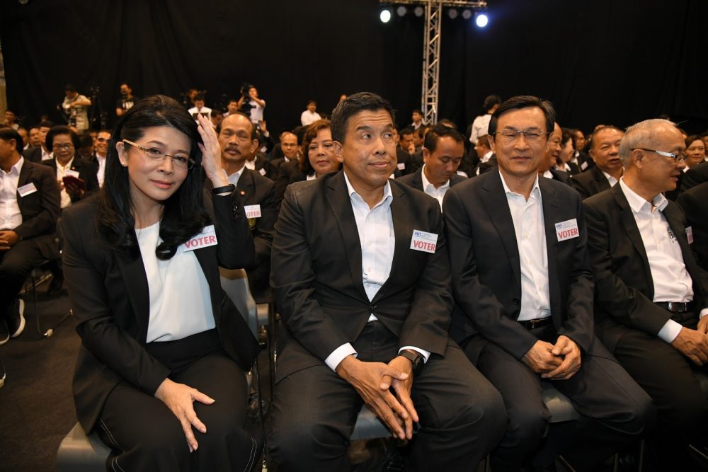 From left, Pheu Thai's Sudarat Kaeyuraphan, Chadchart Sittipunt and Chaturon Chaisang, sit at a Sunday party meeting in Bangkok.