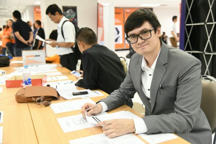 Rangsiman Rome, a former pro-democracy movement leader, registers Saturday as a member of the Future Forward Party.