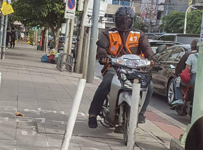 A motorcycle taxi on a sidewalk in Bangkok. Photo: Thailand Footpath / Facebook A motorcycle taxi on a sidewalk in Bangkok. Photo: Thailand Footpath / Facebook