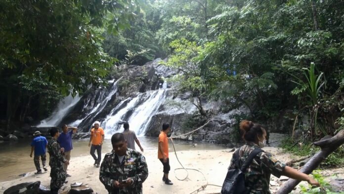 Rangers at the scene of Ton Nga Chang Waterfall on Sept. 20.