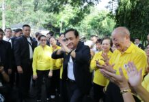 Prayuth Exercises With Park Goers, Denies Campaigning Junta leader Gen. Prayuth Chan-ocha exercises Friday at Lumphini Park in Bangkok.