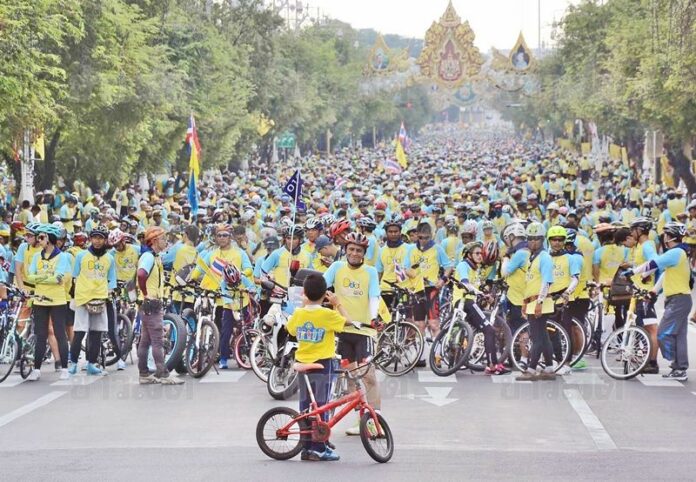 Cyclists prepare for a mass cycling event December 2015 in Bangkok.