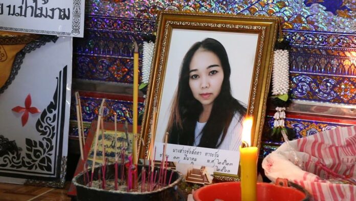 Chorladda Tarawan’s family mourns Tuesday in Khon Kaen, where her body has been taken for funerary rites.