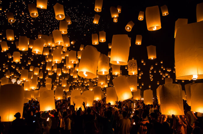 People release sky lanterns during the 2012 Yi Peng festival in Chiang Mai. Photo: John Shedrick / Flickr