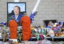 Mechanical Fault Brought Down Vichai’s Helicopter in Leicester Buddhist Monks pay their respects Wednesday at at Leicester City Football Club in Leicester, England. Photo: Mike Egerton / Associated Press