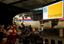 MH17 Families Appeal to Trump to Press Putin for Information Part of the reconstructed Malaysia Airlines Flight 17 plane in 2015. Photo: Peter Dejong / Associated Press